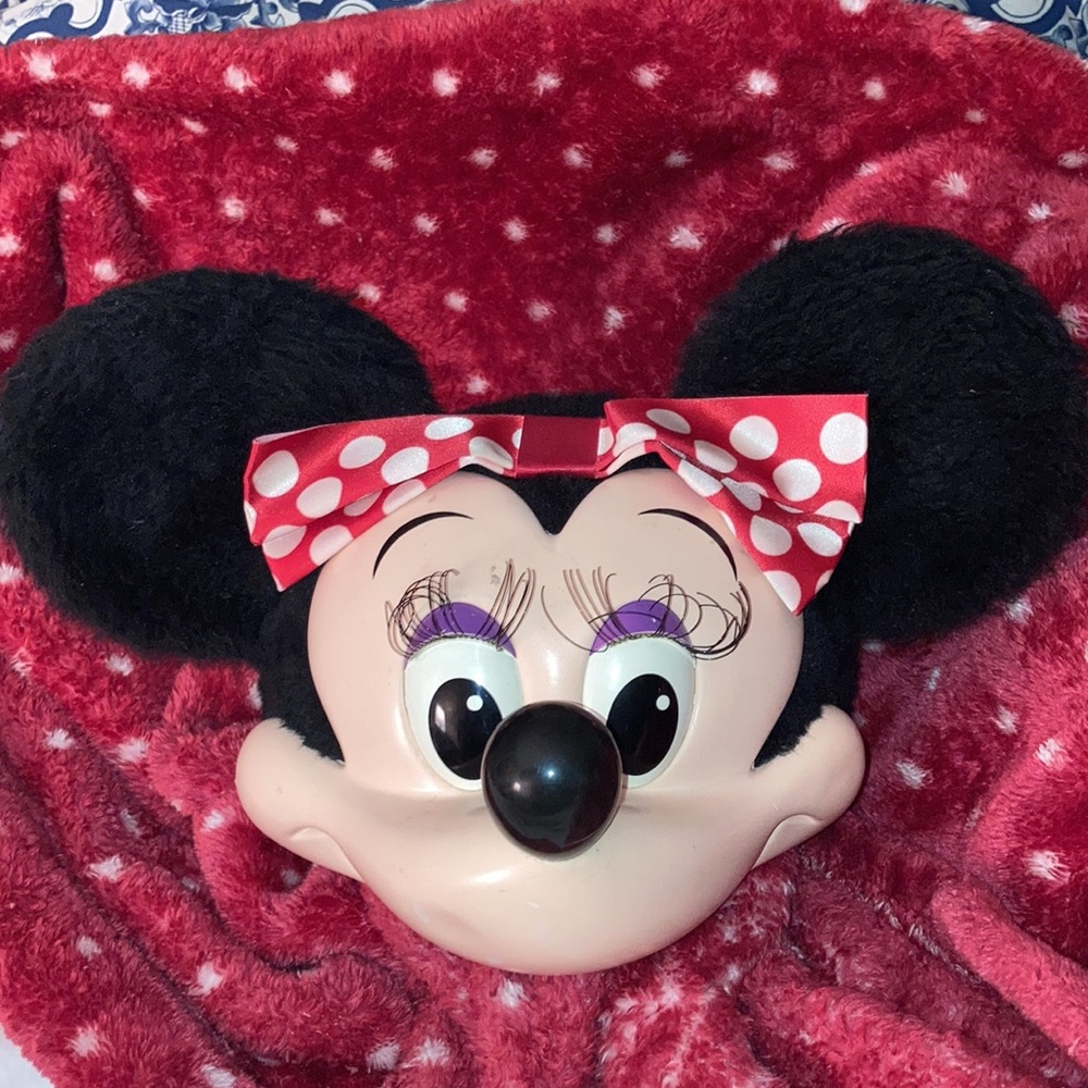 Disney’s Minnie mouse cap  is ready to go with her black stiff ears and red bow.